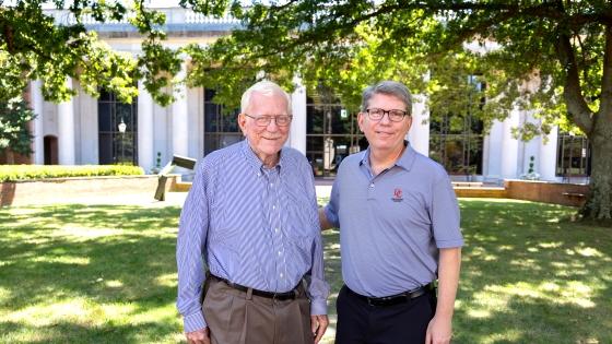 Professor George Abernethy with  College President Doug Hicks ’90
