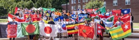  College International Students Hold Country Flags